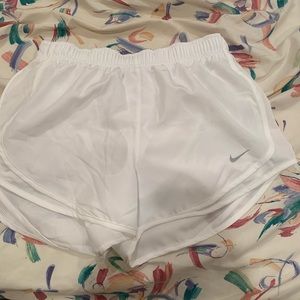 white nike running shorts